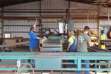 Crew Working On Sawmill